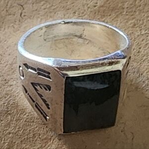 Vintage. Sterling and onyx ring.  Native American, bell trading post. Size 7